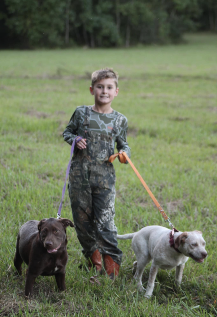 A boy and his pups