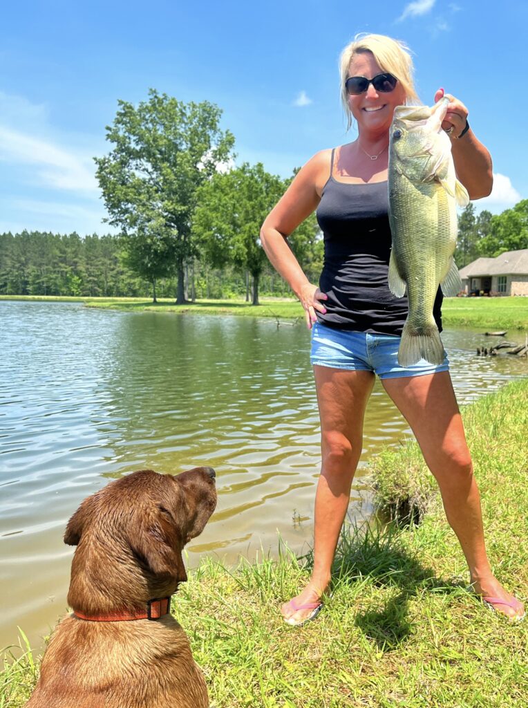 A Girl, Her Lab, & a Big Bass